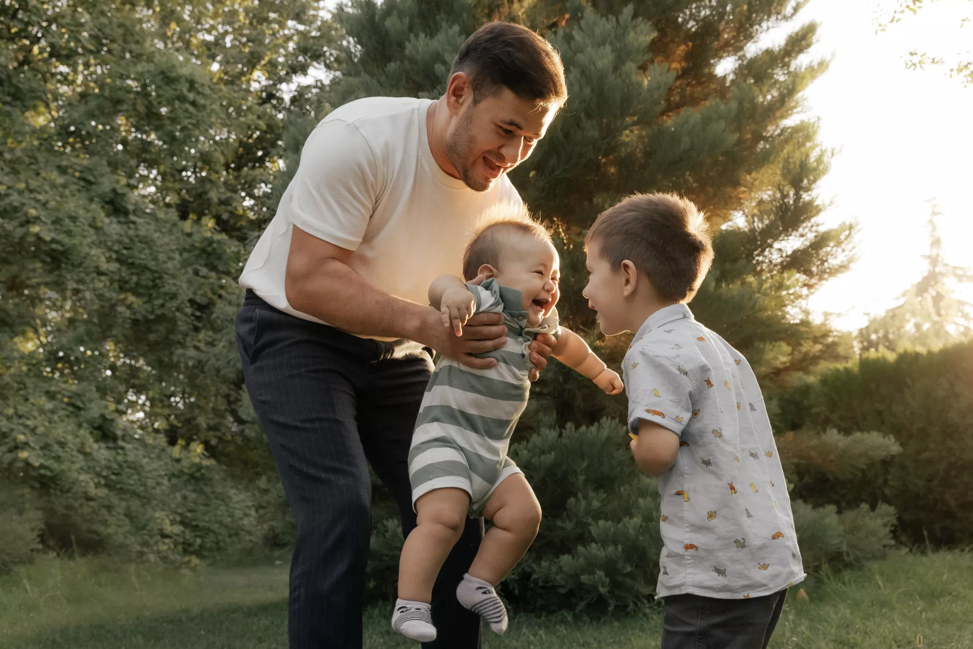Father holding his baby son