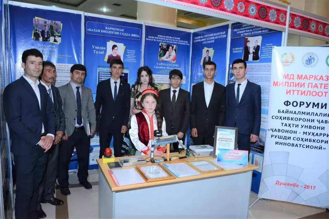 Young people standing at the expo booth
