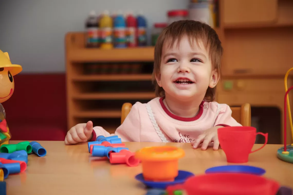 A baby girl smiling 
