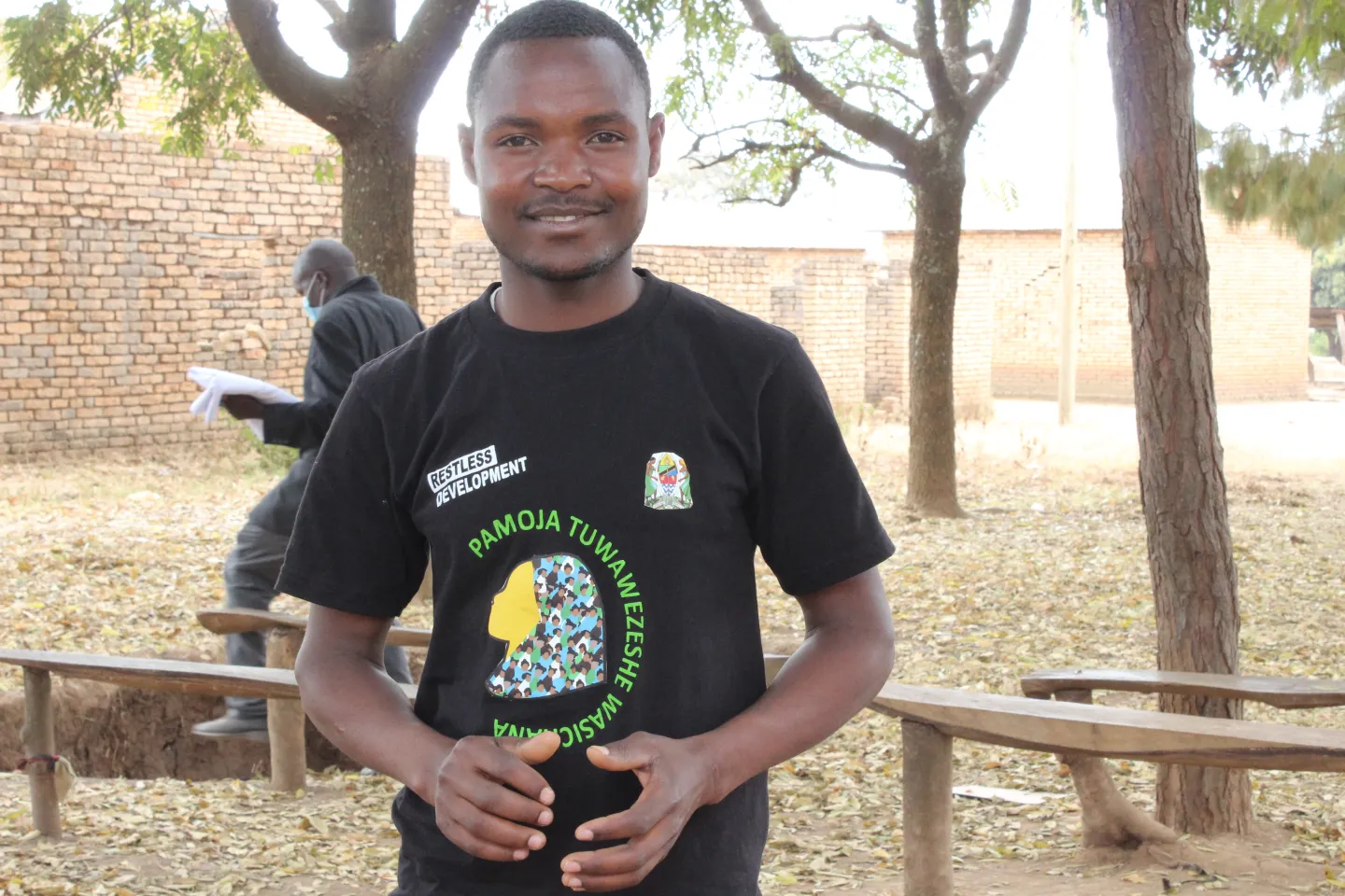 A man smiling towards the camera
