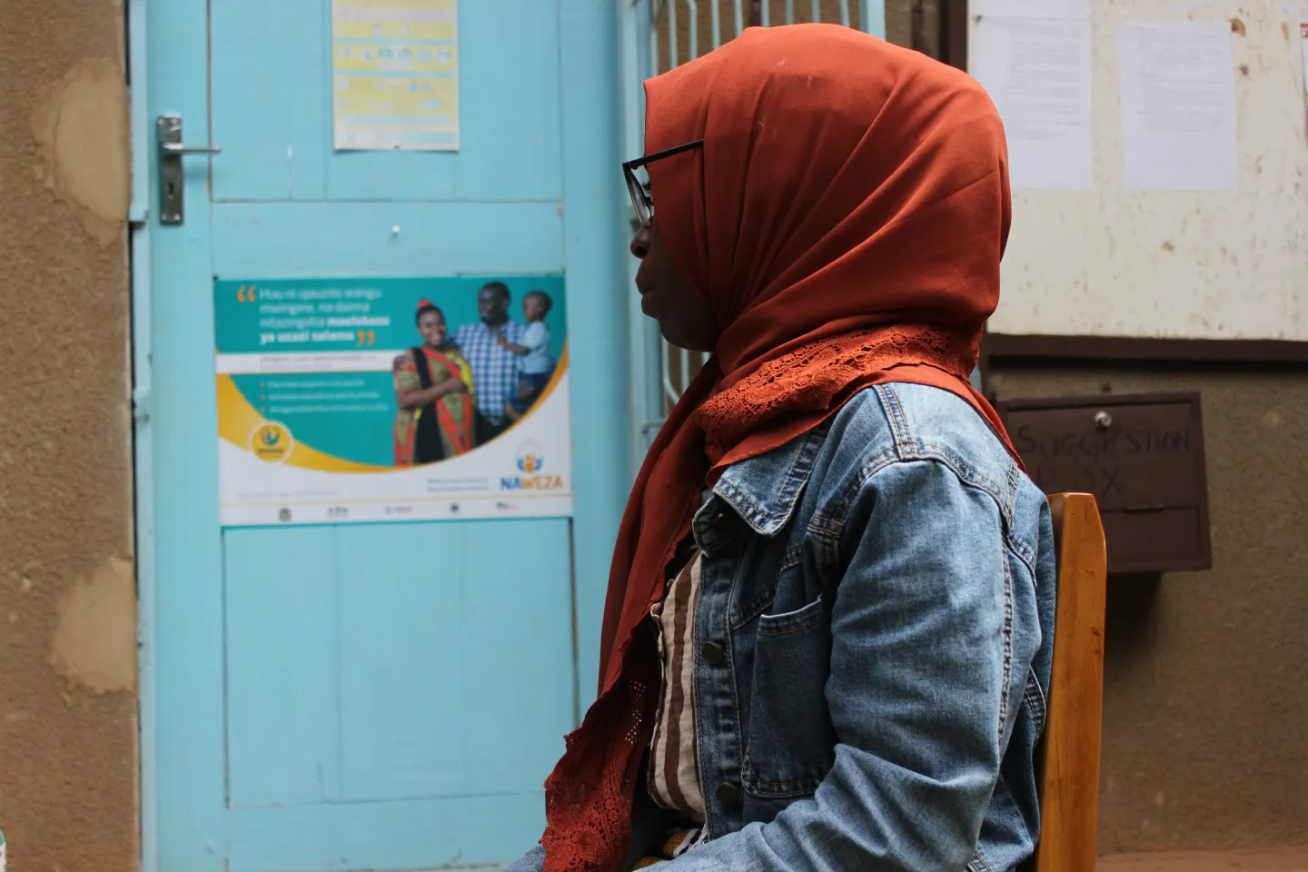 Khadija Abdul, NYP+ chapter secretary at Iringa municipal, Tanzania, seated in front of her office after working hours. 