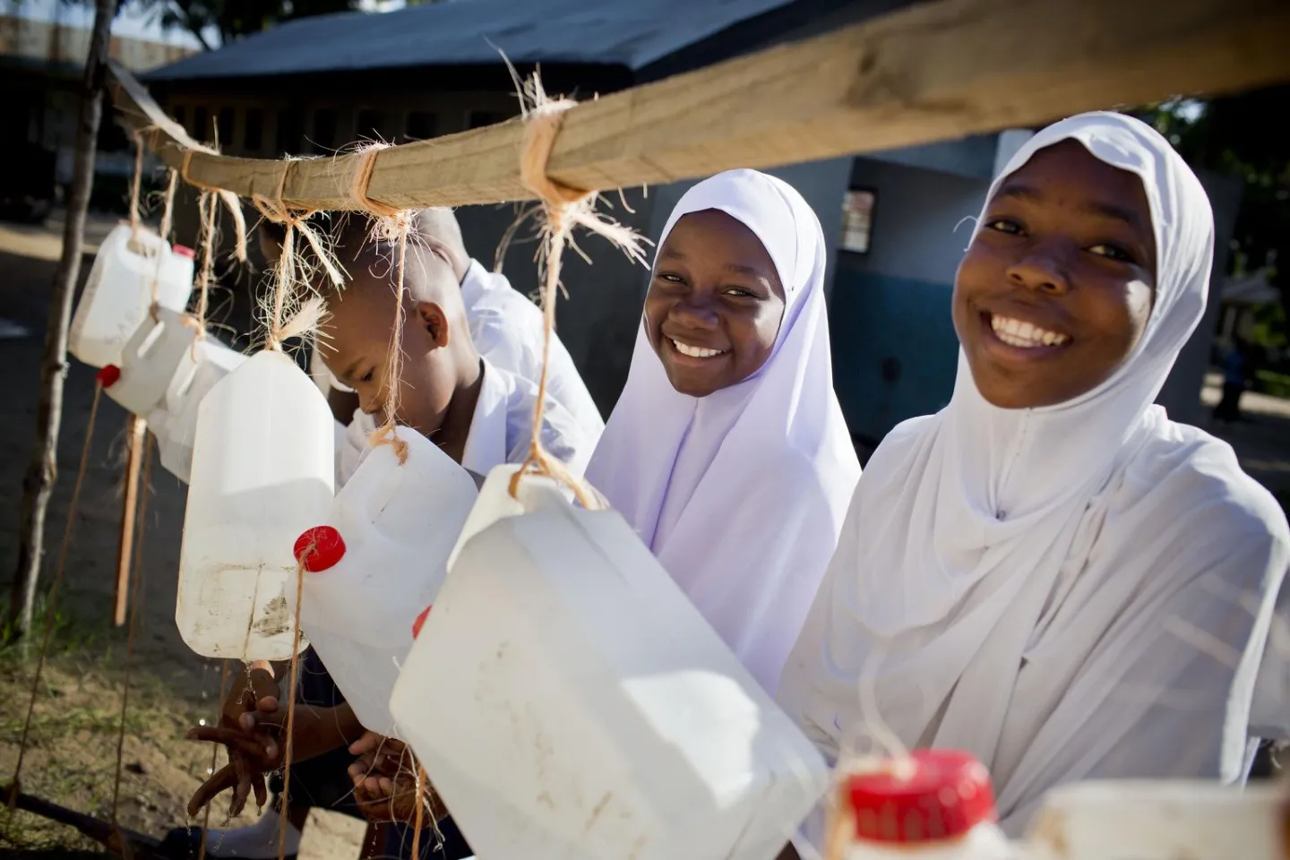 Girls washing their hands