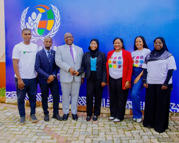 UNICEF's youth advocates and U-reporters with the Deputy Minister of Foreign Affairs and East African Cooperation, Hon. Ngwaru Maghembe at 2026 Tanzania International Model UN 