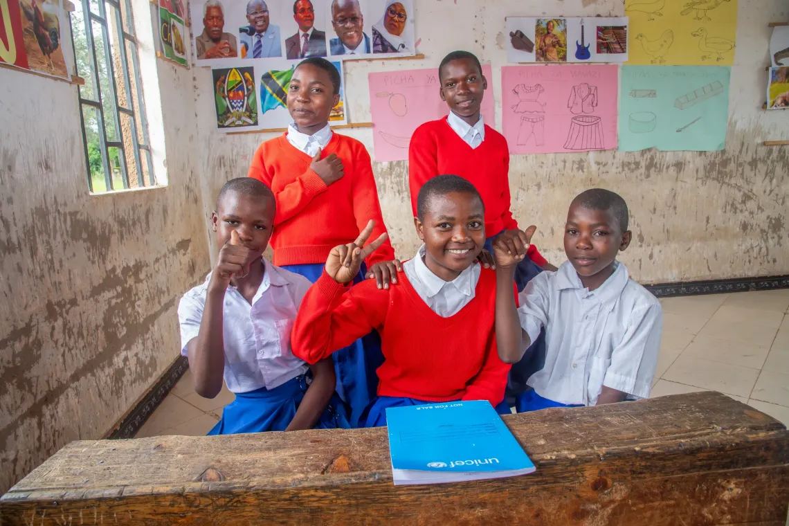 Vestina (centre) with the 4 students she had brought back to school.