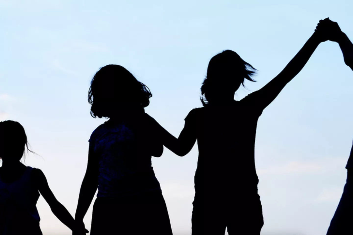 children in silhouette