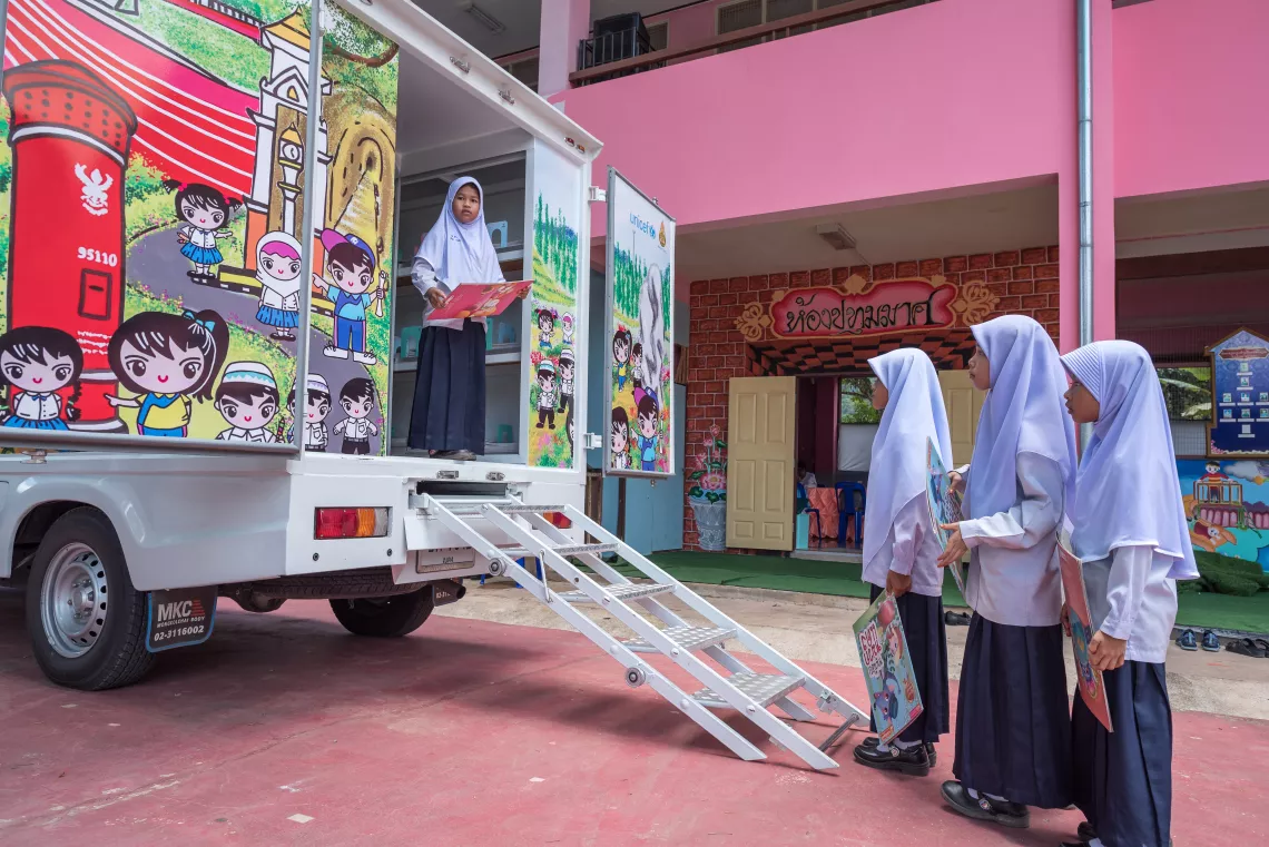 Young students are picking up their favourite books from the Mobile Library.