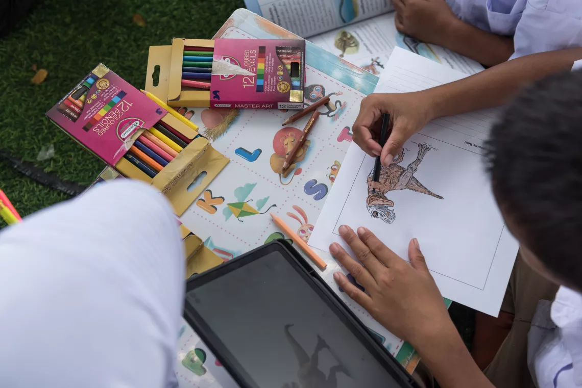 Students are using tablets.
