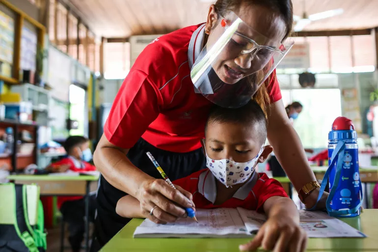 Students at a school in Khon Kaen Province during the first wave of COVID-19 pandemic in Thailand. 