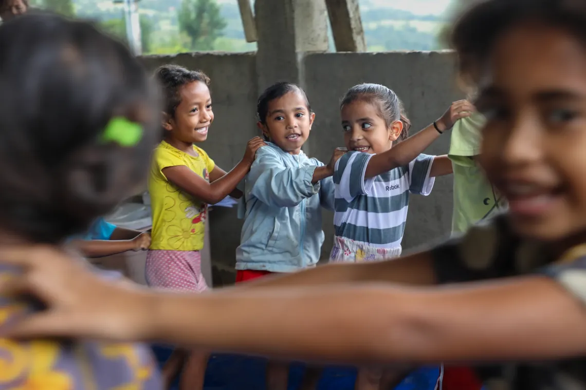 Joana engages her students with games, songs and dances.