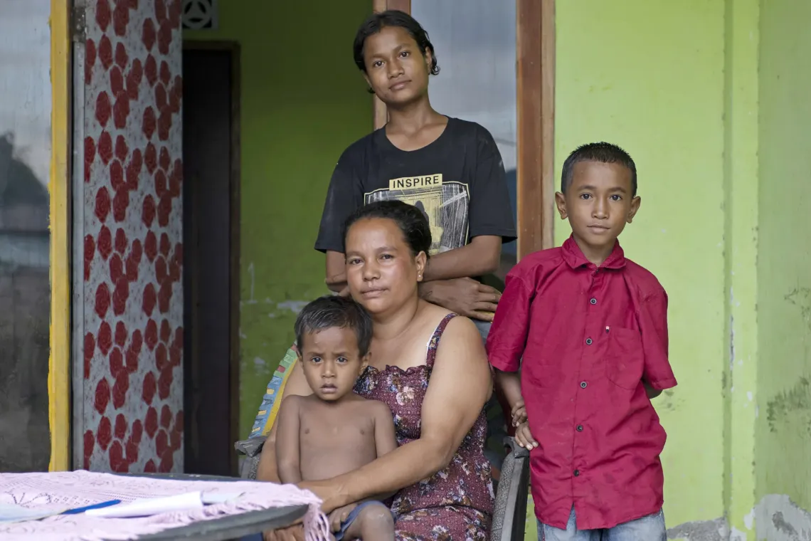Nonia at home with her mother and siblings in Dili, Timor-Leste