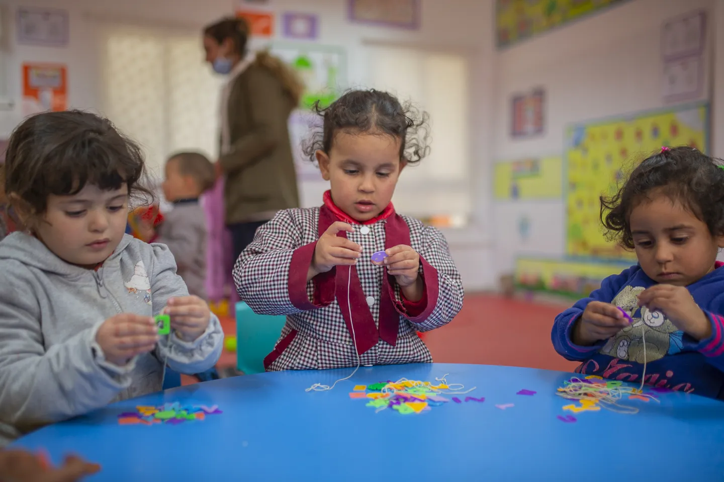 The most important thing kids learn here is sharing, communication, and how to cooperate in activities with their friends. This prepares him or her to go into a school classroom later on. Without this, kids will reject the new school environment, and this will negatively impact his learning and his own psychology.&rdquo; Says Wafa, an instructor from the center. /Haffouz, Kairouan, 2021.