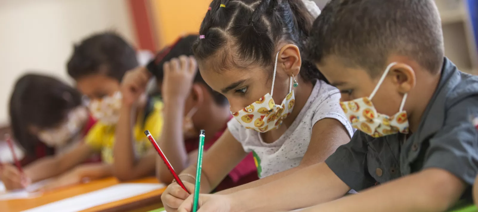 students in class with mask