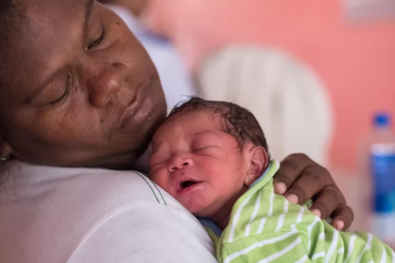 Joana and baby Vilisi at the Post Natal maternity ward at the Colonial War memorial hospital in Suva Fiji. View more with similar tones  
