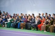 spectators sittinga and clapping