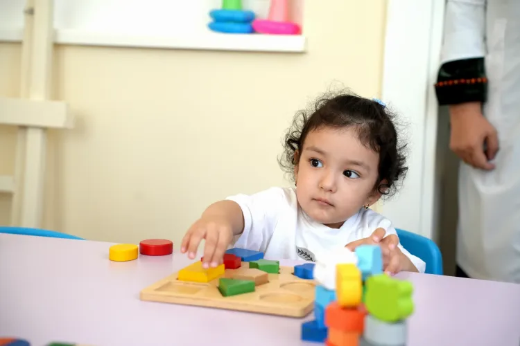 A girl child playing with toys