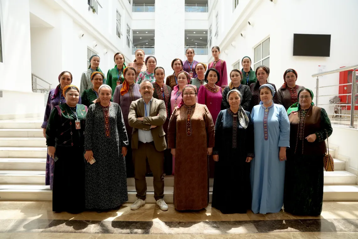 Group photo of participants in the hall