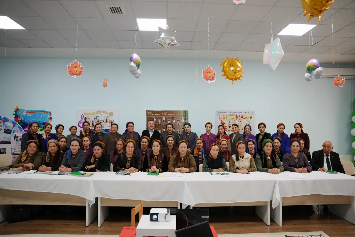 Participants of the seminar and national partners gather for a group photograph during a programme activity in Turkmenistan.