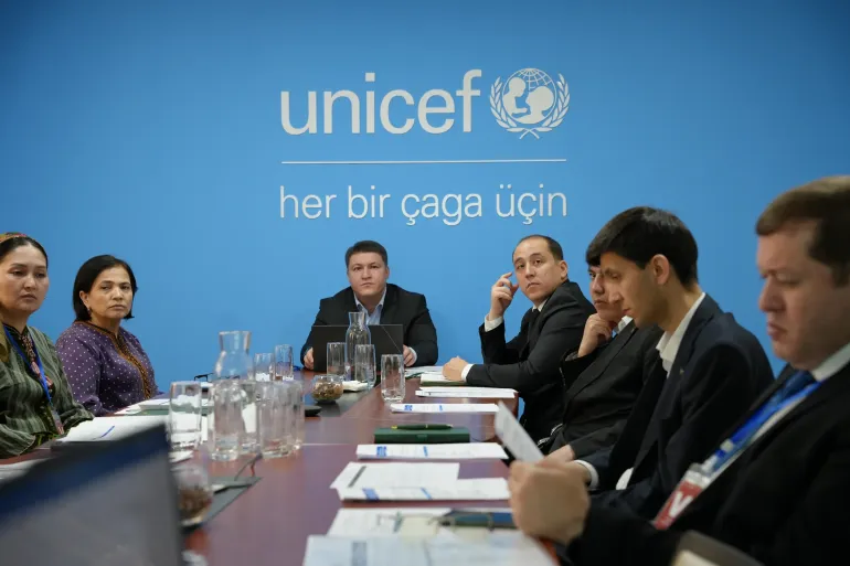 Participants sitting around the table