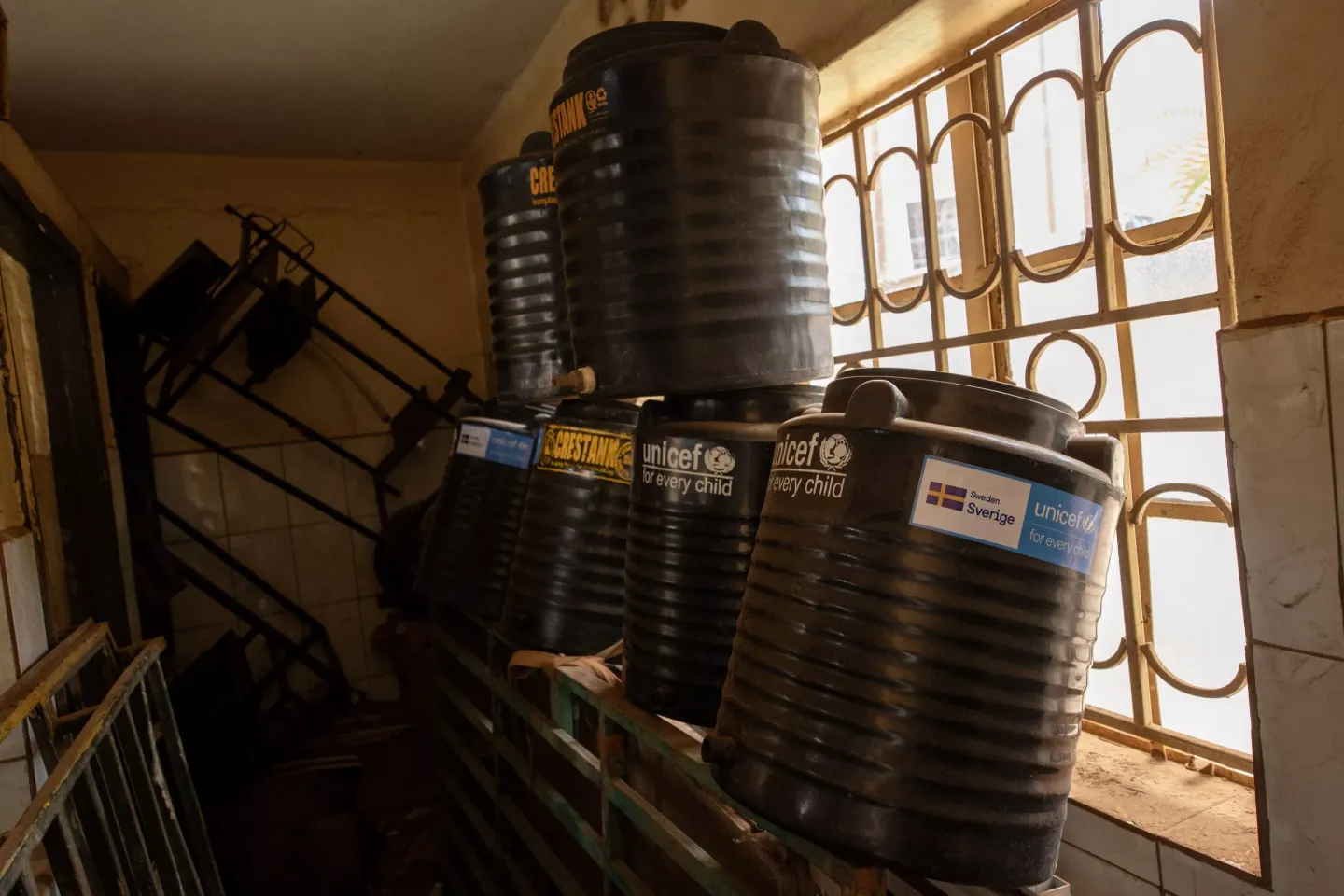 Washing stations with the support of UNICEF at Kiswa HCIV. UNICEF ensured access to clean water and hygiene facilities in schools, health centres and communities through distributing tap stands, bleach and sanitizer critical to limiting the spread of the Ebola virus.
