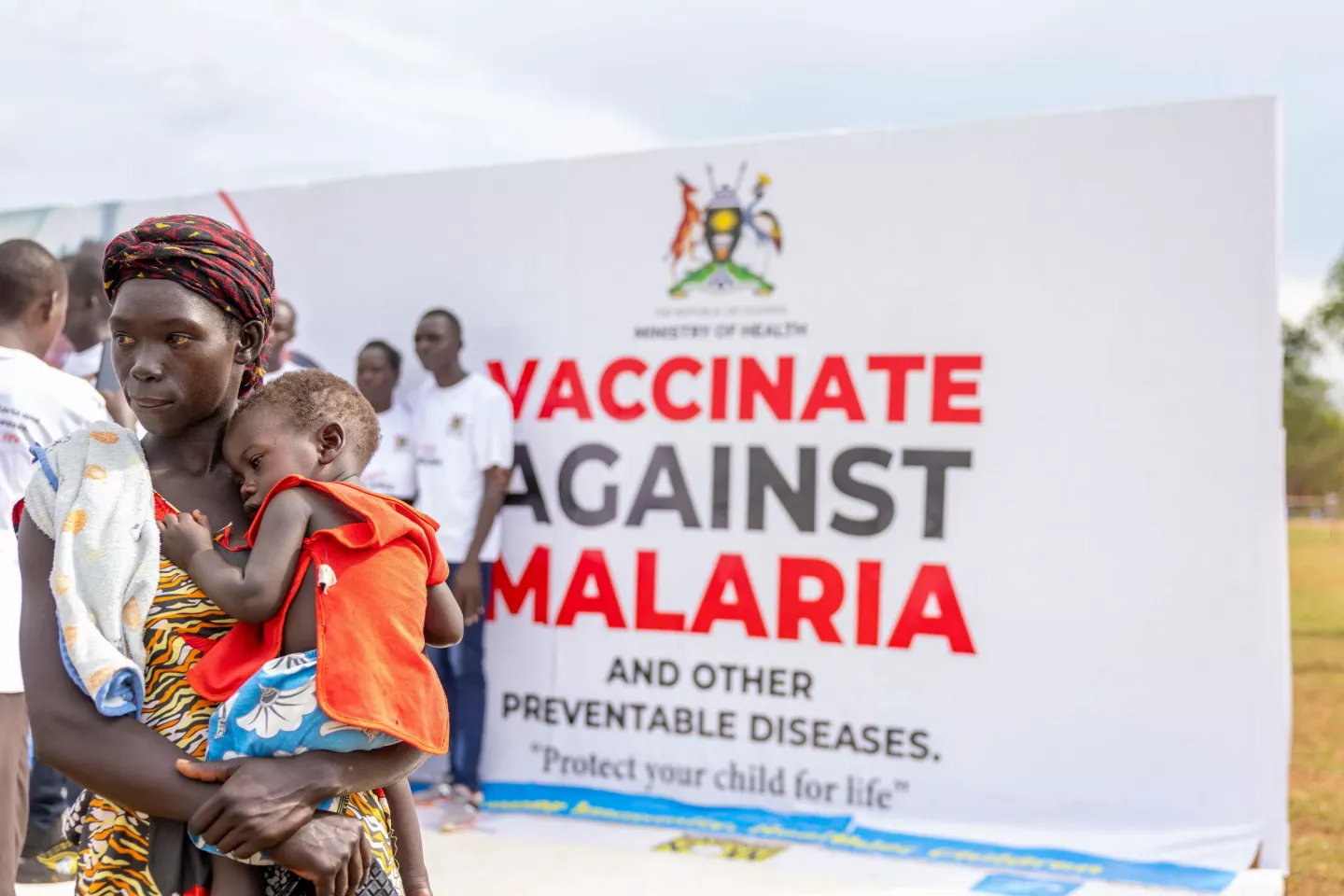 One of the mothers, Caroline Akot, 31, holds her 9-month-old child during the national launch of the malaria vaccine into Uganda&rsquo;s routine immunization schedule, held at Boma Grounds in Apac District on April 2, 2025. Caroline&rsquo;s baby tested positive for malaria and was given treatment during the event.