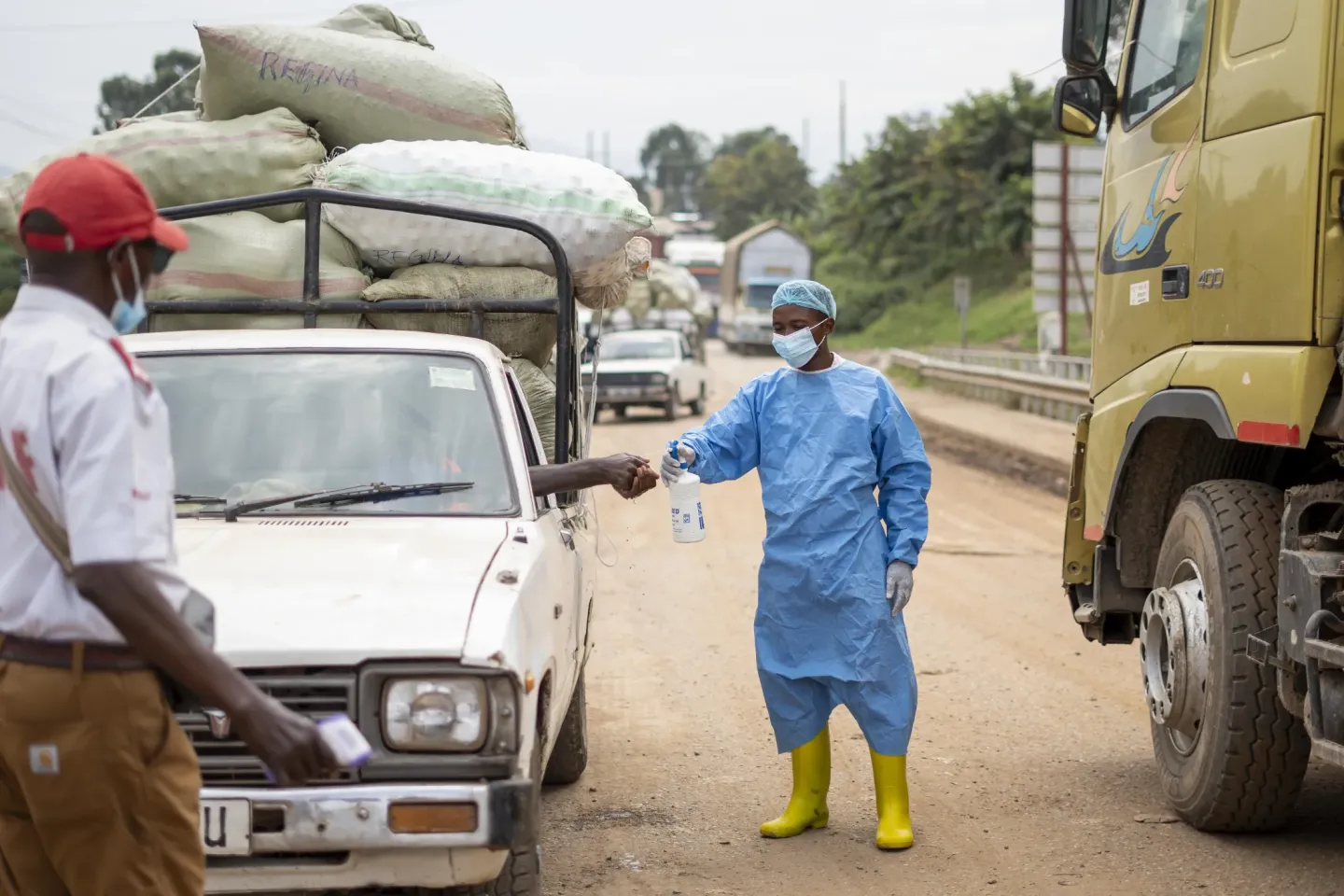 Travelers undergo Ebola screening at the Mpondwe border crossing in Kasese District.