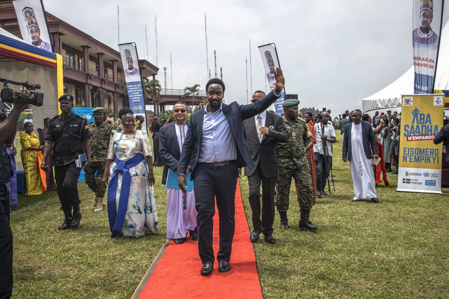 His Majesty William Wilberforce Kadhumbula Gabula Nadiope IV, the Kyabazinga of Busoga, waves to guests as he arrives at the venue for the UNICEF Uganda and Kyabazinga Initiative partnership event at Igenge Palace in Jinja, Uganda, on August 7, 2026. 