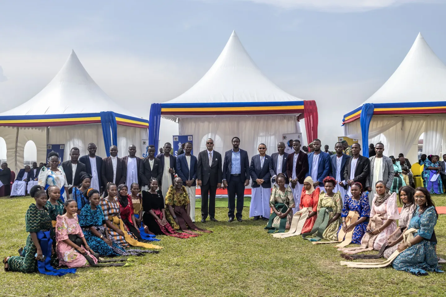 His Majesty William Wilberforce Kadhumbula Gabula Nadiope IV, the Kyabazinga of Busoga, poses for a group photograph with guests alongside Dr. Robin Nandy, UNICEF Uganda Country Representative, and Owek. Al-Hajj Ahmed Osman Noor, Deputy Prime Minister and Head of Partnerships for the Busoga Kingdom, during the UNICEF Uganda and Kyabazinga Initiative partnership event at Igenge Palace in Jinja, Uganda, on August 7, 2026.