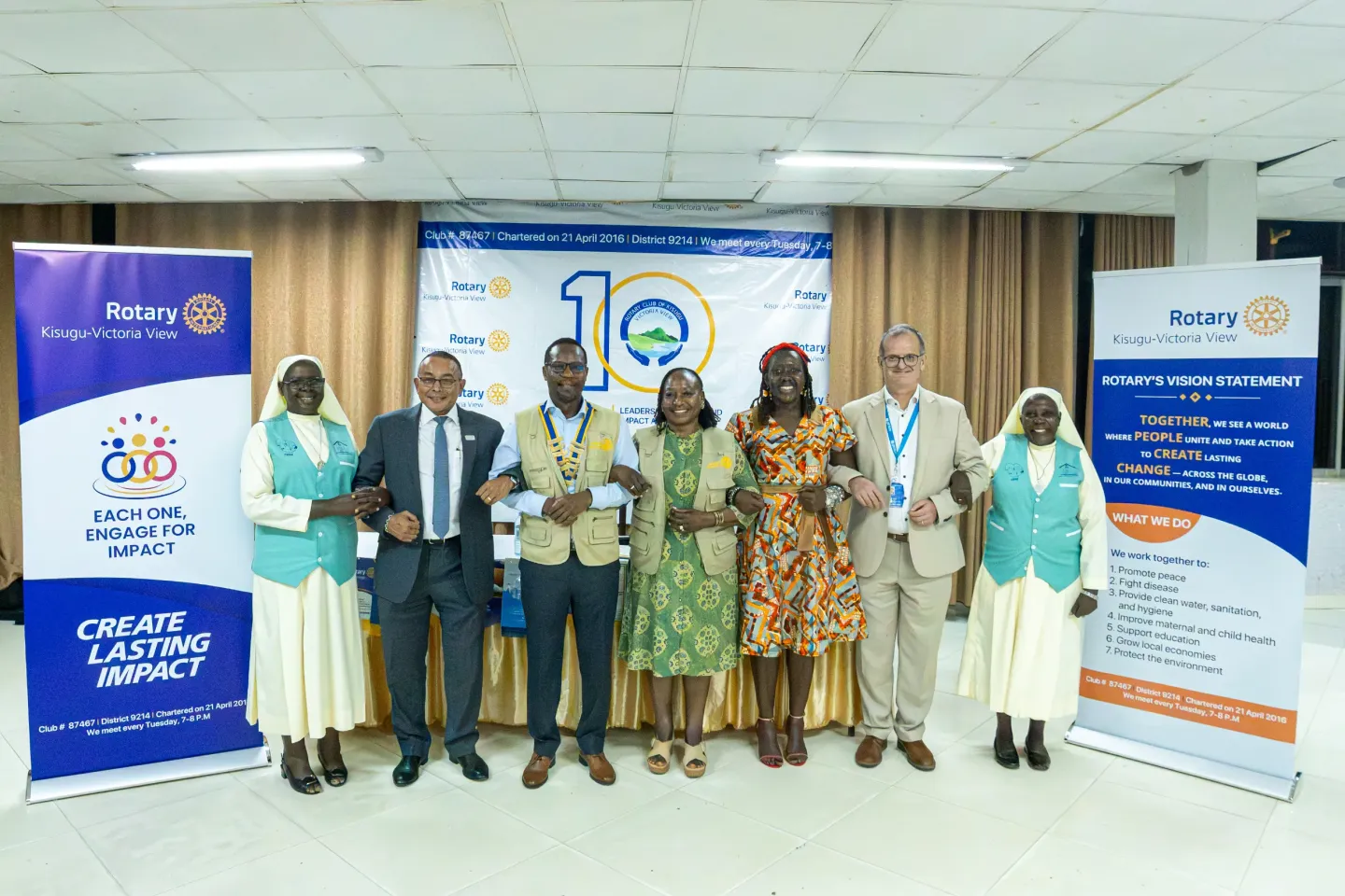 Bernard Tabaire, President of the Rotary Club of Kisugu Victoria View, together with Dr. Robin Nandy, UNICEF Uganda Country Representative, alongisde UNICEF staff, &nbsp;and other partners hold hands during a group photo at the inaugural fellowship of the Rotary Club of Kisugu Victoria View for the 2026/2027 Rotary year at Hotel International Muyenga in Kampala, Uganda, on July 7, 2026.