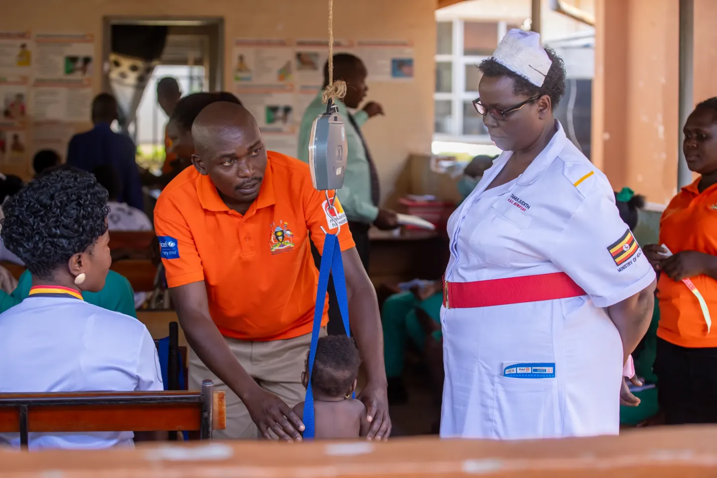 Sister Taaka Judith supervises a Community Health Extension Worker at Masafu General Hospital, Busia District. 