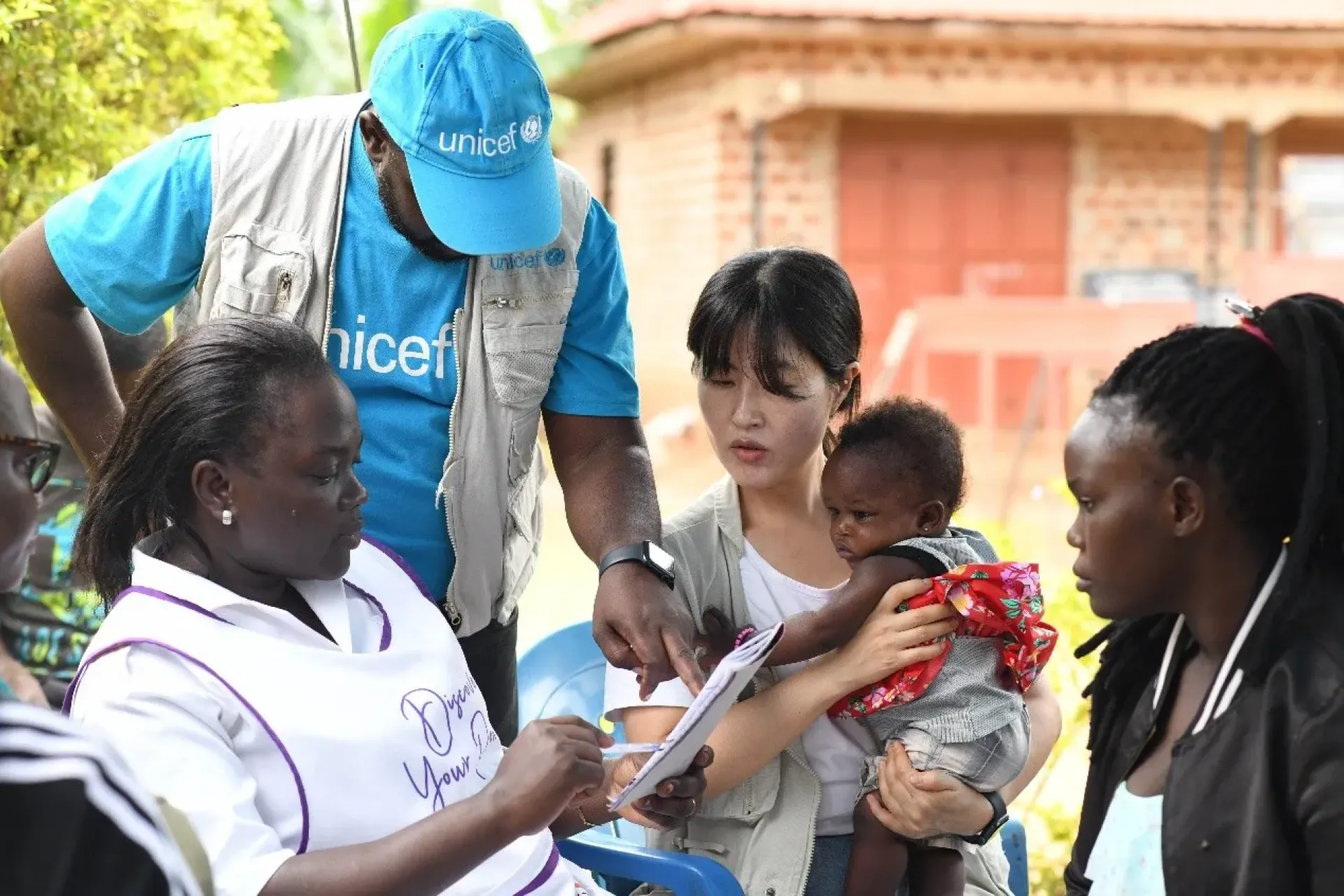 According to Savio Kakeeto, a Zero Dose Consultant at UNICEF Uganda, approximately 312 outreaches are conducted monthly with funding from the Republic of Korea across the three districts between October and December in 2025, reaching underserved children.  &ldquo;With increased awareness, we are certain that one day, all of our children will be fully immunized,&rdquo; Namuli says, while reviewing the day&rsquo;s number of immunized children, in the government immunization records book.  Though immunization is done within the