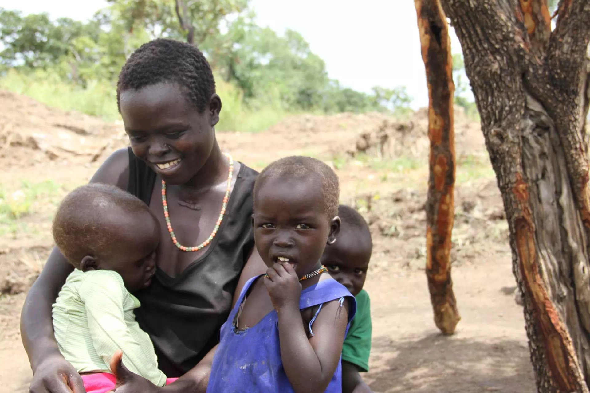 A woman and three children