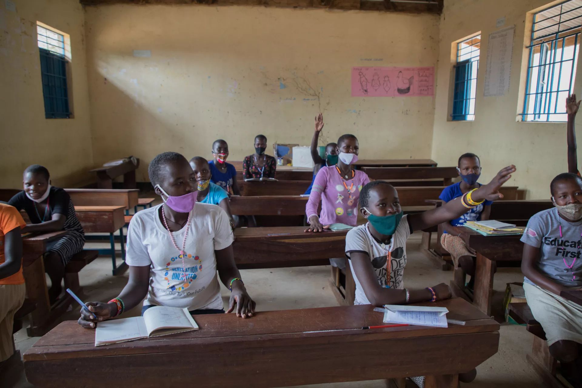 schoolchildren active in a classroom