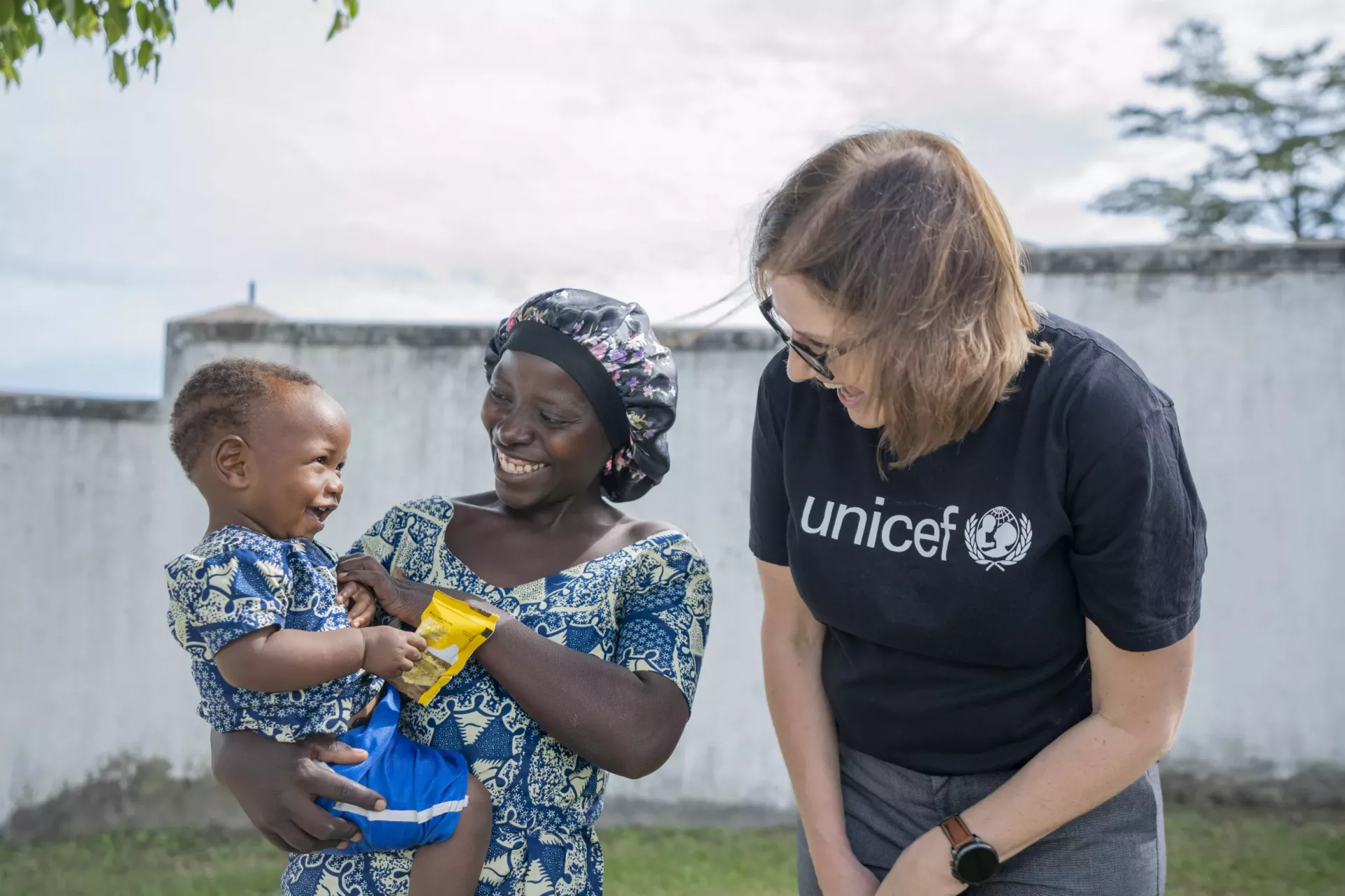 Christiane Rudat, UNICEF Regional Nutrition Advisor, shares a moment with Mwamini Devota, a mother from Rwamwanja Refugee Settlement and her baby during The Egg Powder Initiative for Children (EPIC) &nbsp;launch event in Kamwenge District, April 23rd 2025