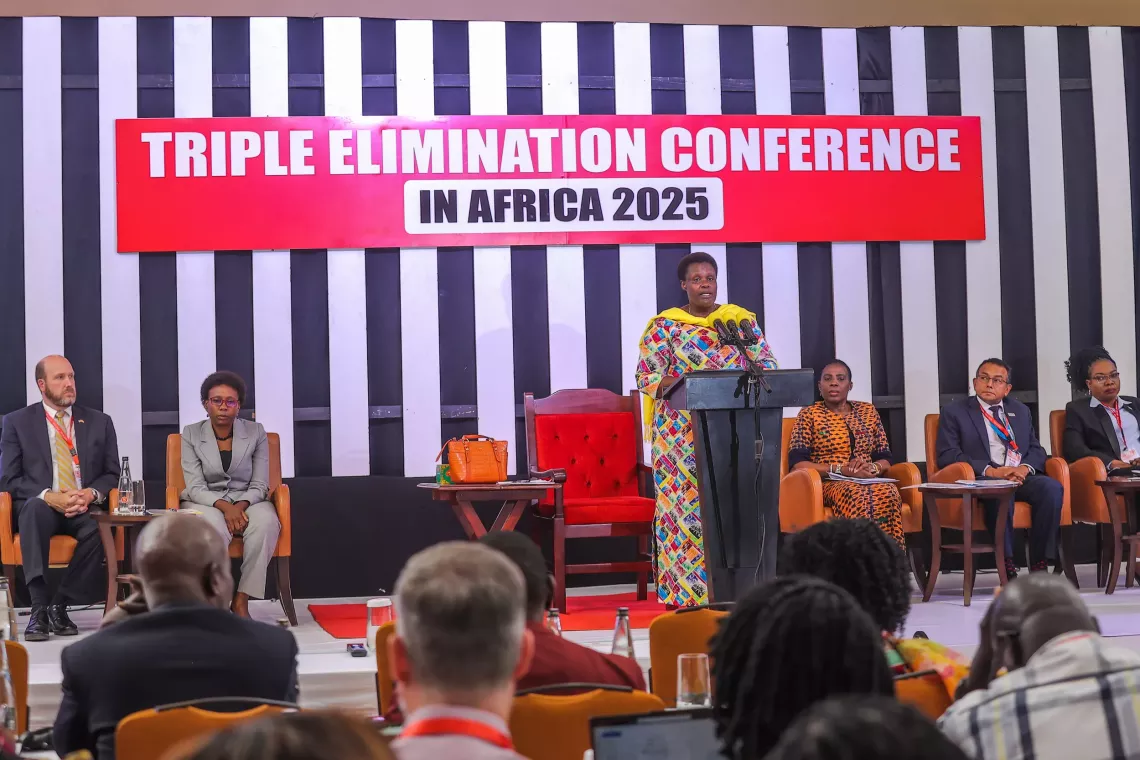 H.E. Jessica Alupo, Vice President of Uganda, addresses delegates at the High-Level Ministerial Conference on Triple Elimination in Kampala. Speaking on behalf of President Museveni, she urged participants to "scale up" efforts to end mother-to-child transmission of HIV, Hepatitis B, and Syphilis by 2030.