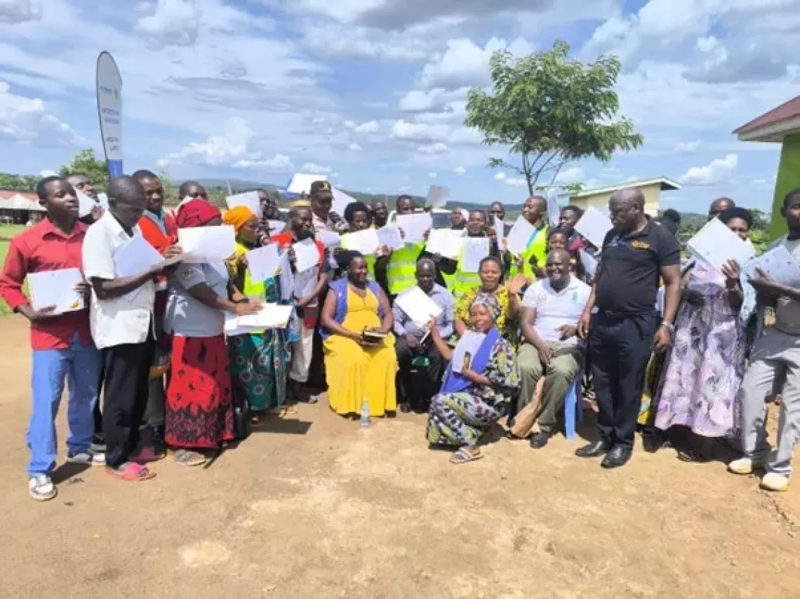 Recognition ceremony for para social workers held at Mahega Training Center in Nkoma/Katalyeba TC, presided over by the Assistant Commissioner from the Ministry of Gender, Labour and Social Development.