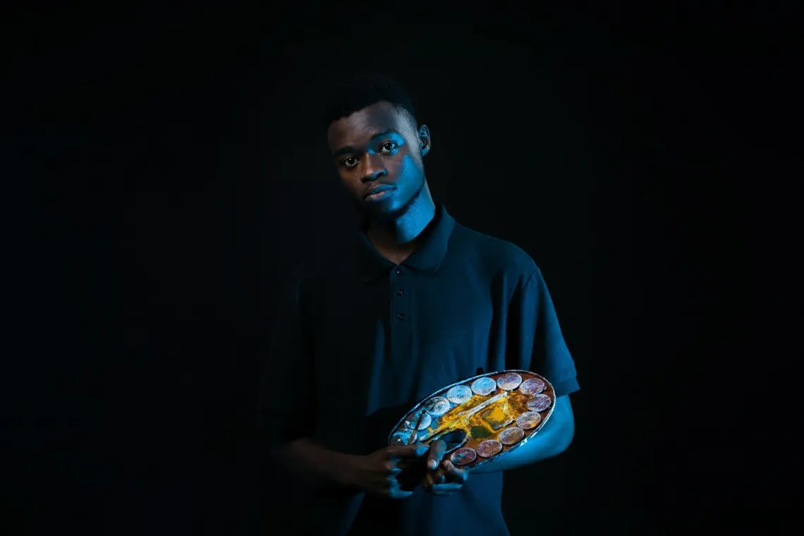 Ashahiid Juma, 22, holds his prized paint pallet. Asahiid, 22, finds mental relief from painting his life experiences and what he feels on the inside. &lsquo;Every time I paint, it feels like my problem is shared