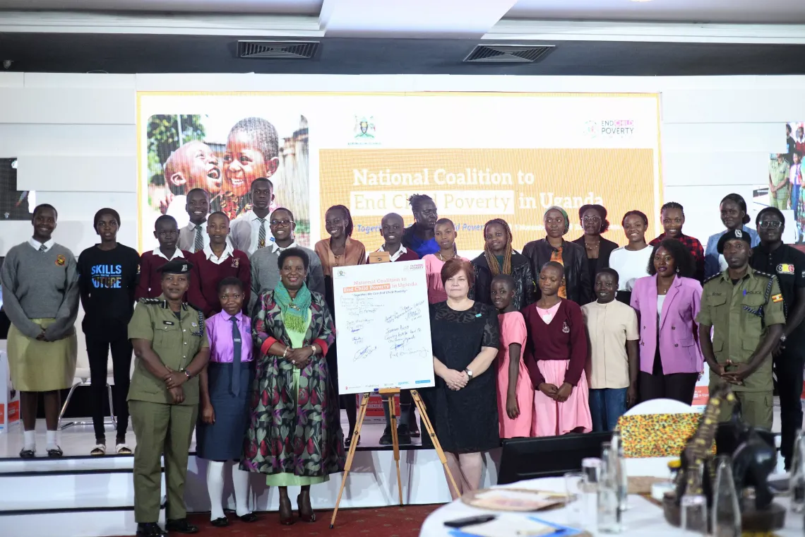 The Minister of Gender Labour and Social Development Hon. Betty Amongi Ongom (First raw: 3rd left) and Deputy Representative Programmes UNICEF Uganda Margarita Tileva (First raw: 4th left) pose for a group photo with children at the launch the National Coalition to end child poverty in Uganda.