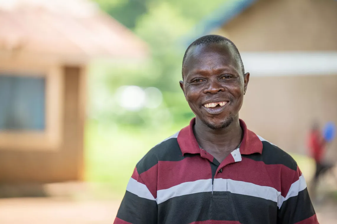 A portrait of Simon Peter Achingun 45 years old a trainer of trainees for caregivers under Nakapiripirit District. 