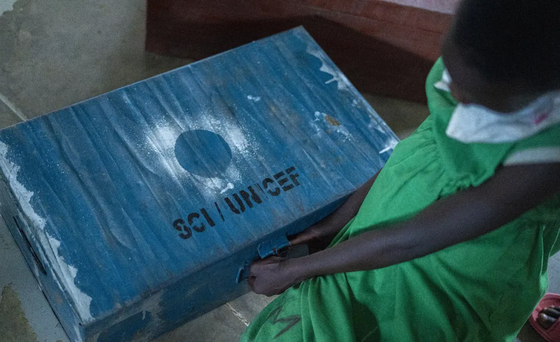 Storage boxes in one of the dormitories at Loodoi Primary School, Napak District.