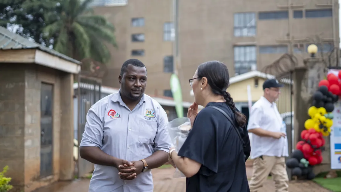Mr John Mugisha, National Coordinator of SAUTI-116, interacts with Swedish Member of Parliament Katarina Tolgfors (Moderate Party) during the visit to the SAUTI-116 offices in Kireka, Wakiso District