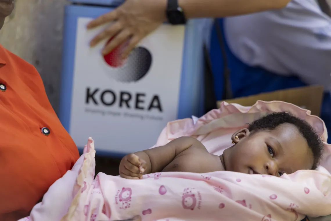 Six-week-old Devona Weere, born on October 28, 2025, is ready to receive her immunization shots from her home in Kanakulya Village, Makindye Division. This immunization initiative is made possible through door-to-door outreach by UNICEF, with support from the Republic of Korea, as part of efforts to maintain and strengthen essential health services through ACT-A investments.