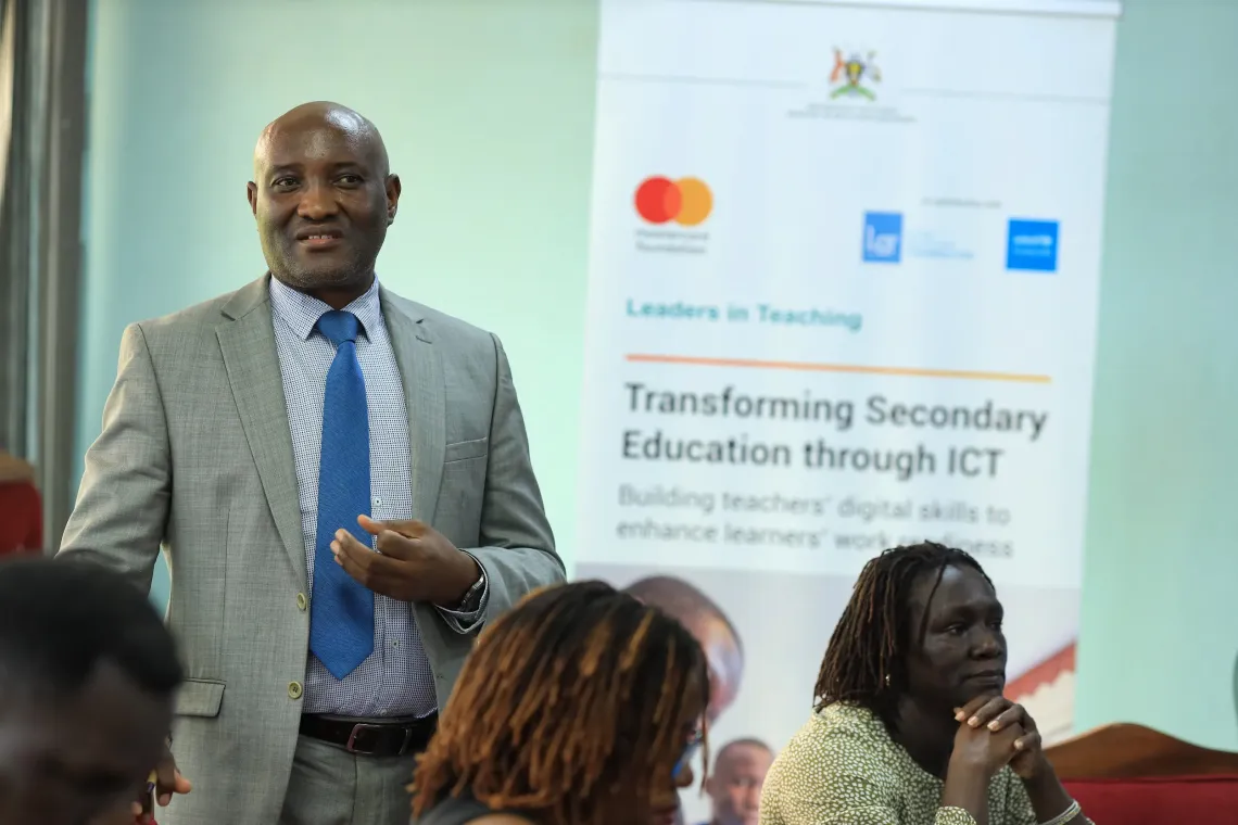 Ben Mugisha, Ministry of Education and Sports Lead ICT Specialist and Consultant, delivers a presentation during the validation workshop for the Digital Agenda Strategy Costed Implementation Roadmap in Kampala on March 11, 2026.