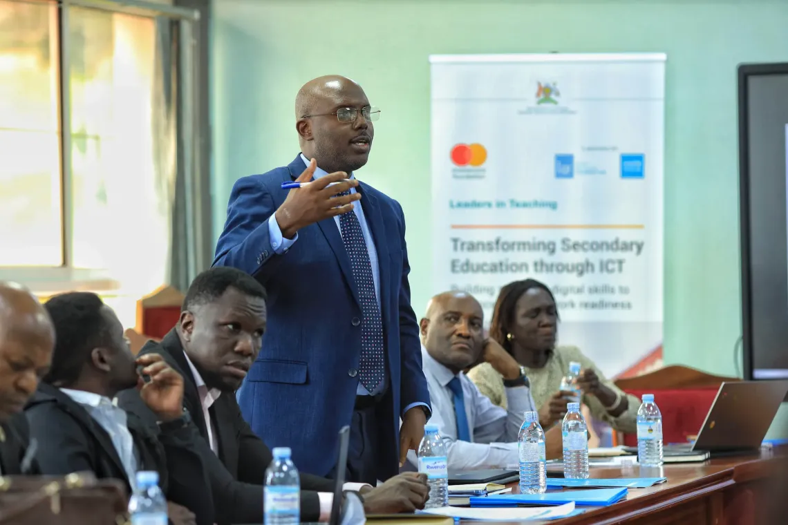 A participant shares views and contributes to discussions during the validation workshop for the Digital Agenda Strategy Costed Implementation Roadmap in Kampala on March 11, 2026.