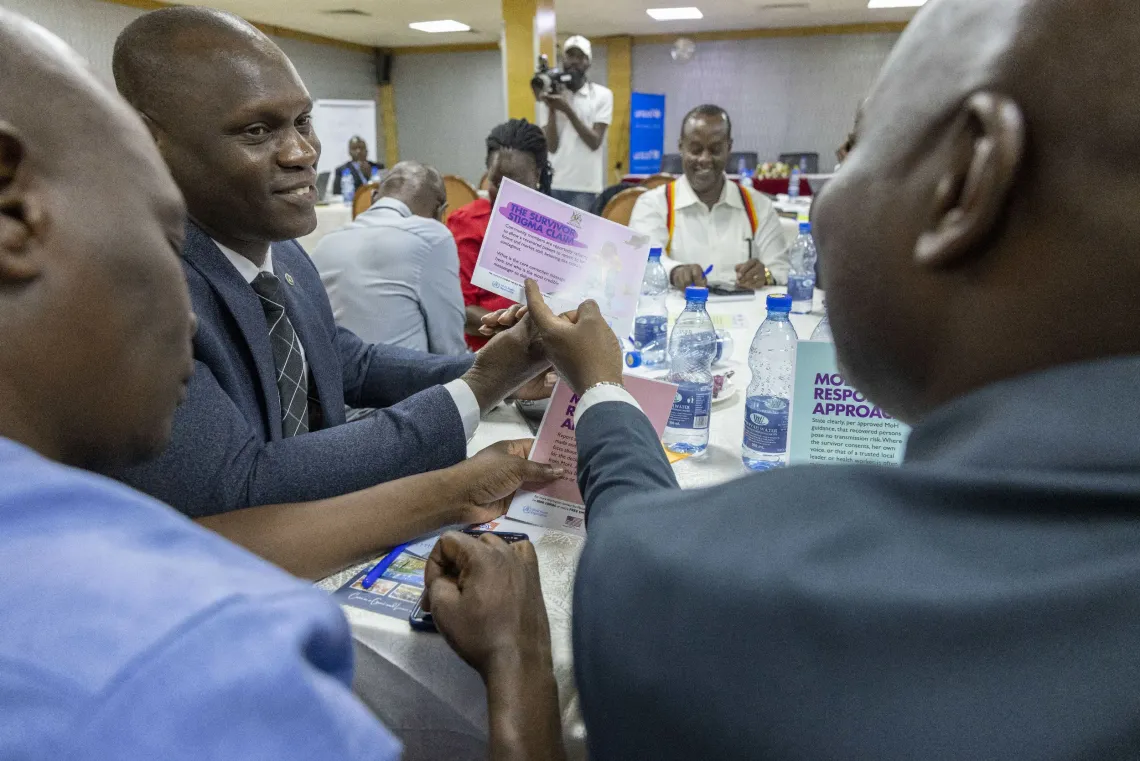 Participants compare response options during a practical exercise designed to strengthen communication during public health emergencies. The exercise formed part of a Ministry of Health engagement supported by UNICEF in Kampala