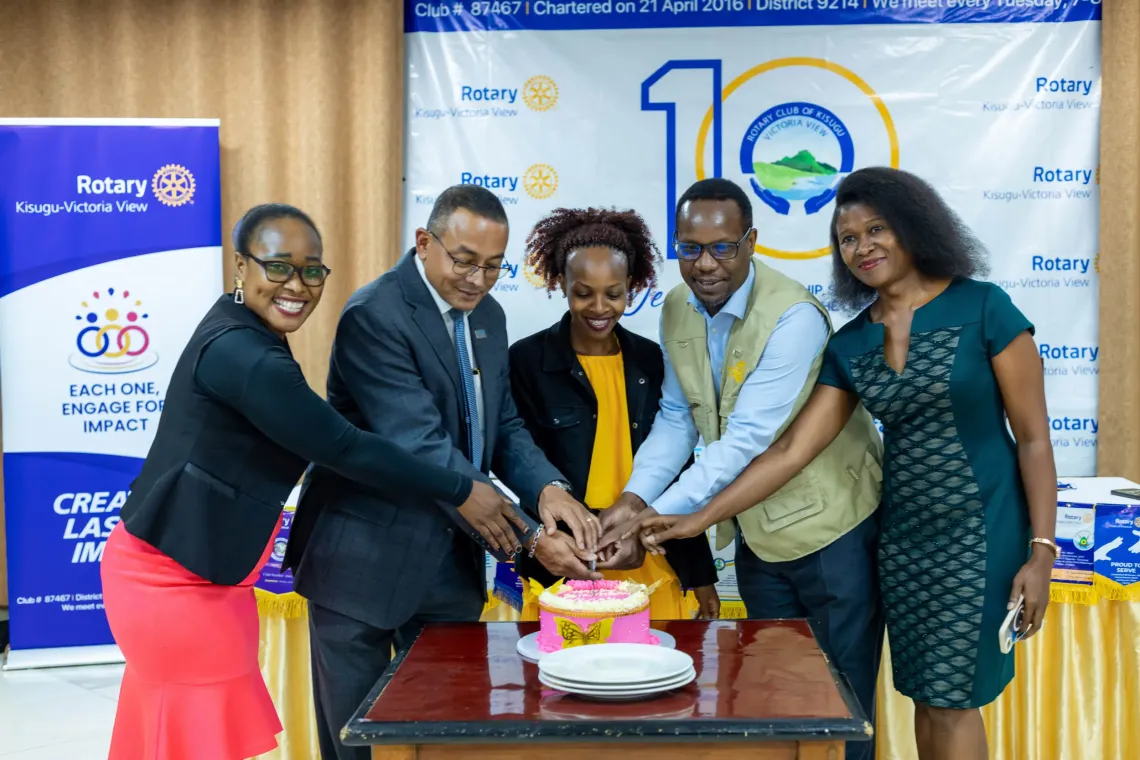 Rotary members and guests cut a ceremonial cake during the inaugural fellowship of the Rotary Club of Kisugu Victoria View for the 2026/2027 Rotary year at Hotel International Muyenga in Kampala, Uganda, on July 7, 2026. 