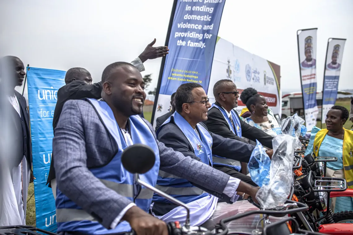Dr. Robin Nandy, UNICEF Uganda Country Representative, hands over motorcycles to Owek. Al-Hajj Ahmed Osman Noor, Deputy Prime Minister and Head of Partnerships for the Busoga Kingdom, during the UNICEF Uganda and Kyabazinga Initiative partnership event at Igenge Palace in Jinja, Uganda, on August 7, 2026. The motorcycles form part of equipment and materials provided by UNICEF Uganda to support community outreach and strengthen the Kyabazinga Initiative&rsquo;s ability to reach children, families and communities a