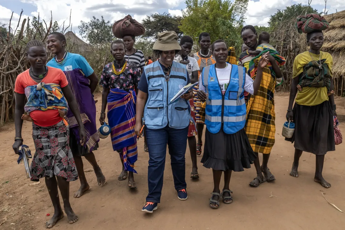 Pauline Mwaniki, Humanitarian Affairs Officer with the United Nations Office for the Coordination of Humanitarian Affairs (OCHA), leads a focus group discussion with women at Nakatapan Outpost in Lolelia South, Kaabong District, Uganda, on August 11, 2026.