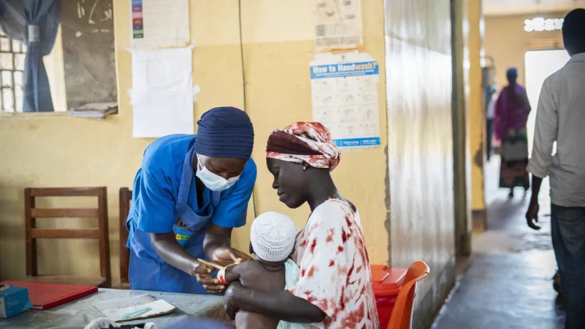 Nafsi Nairah, 31, brings her baby for a nutrition assessment at Yumbe Health Centre IV in Yumbe District, Uganda. Her 29-month-old son was diagnosed with severe acute malnutrition after becoming seriously ill and is now receiving treatment at the facility.