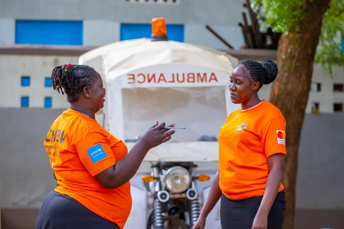 Community Health Extension Workers (CHEWs) chat at Namakwekwe Health Center III as part of the Government of Uganda's CHEWs Programme, led by the Ministry of Health with support from UNICEF and funding from the Mastercard Foundation.