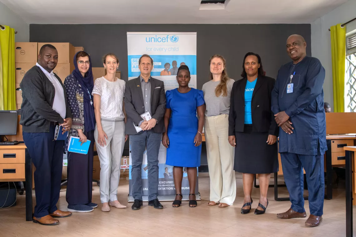 Donors from the Foreign, Commonwealth & Development Office (GoVUK), Embassy of Sweden in Uganda, British High Commission and UNICEF officials pose for a group portrait after a successful visit at the SAUTI-116 Helpline offices in Kireka, Kampala